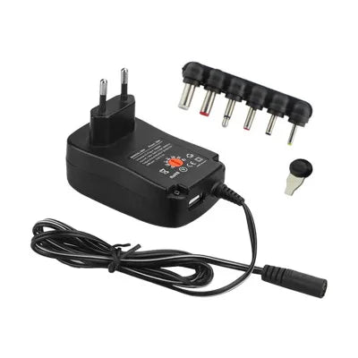 Adjustable 3 to 12 V power adapter with interchangeable tips