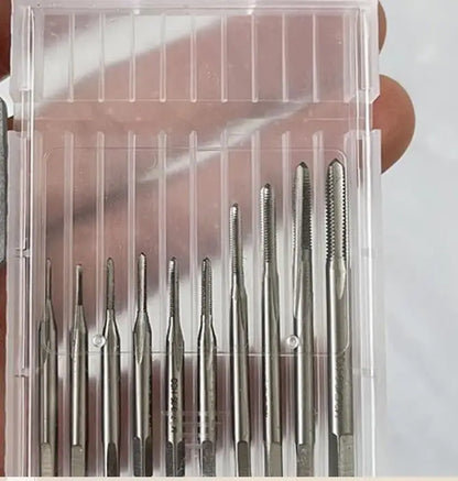 The taps in their slotted plastic case