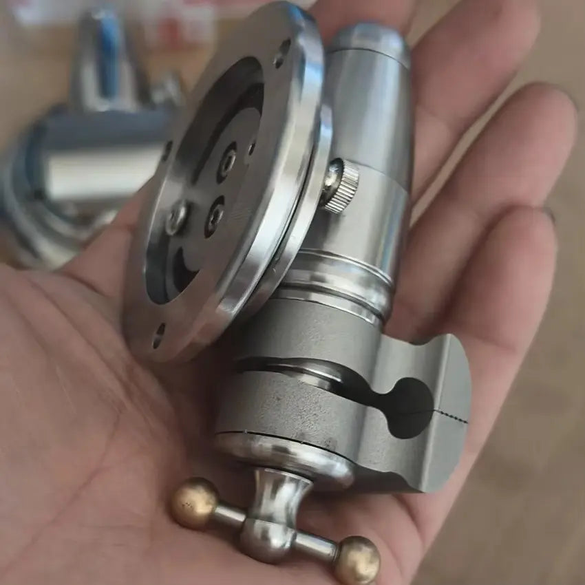 Underside of the round base with its mounting holes