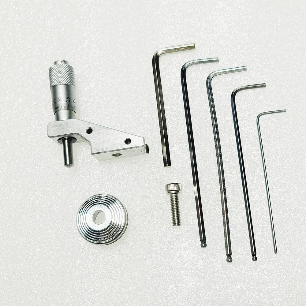 Micrometer head on its bracket with the cone pulley, screw and hex keys