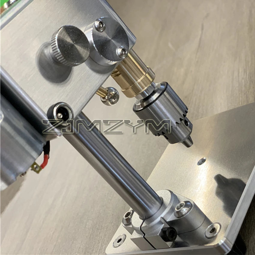 Mini drill press drilling a small part