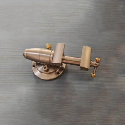 The vise held in a hand, showing its size