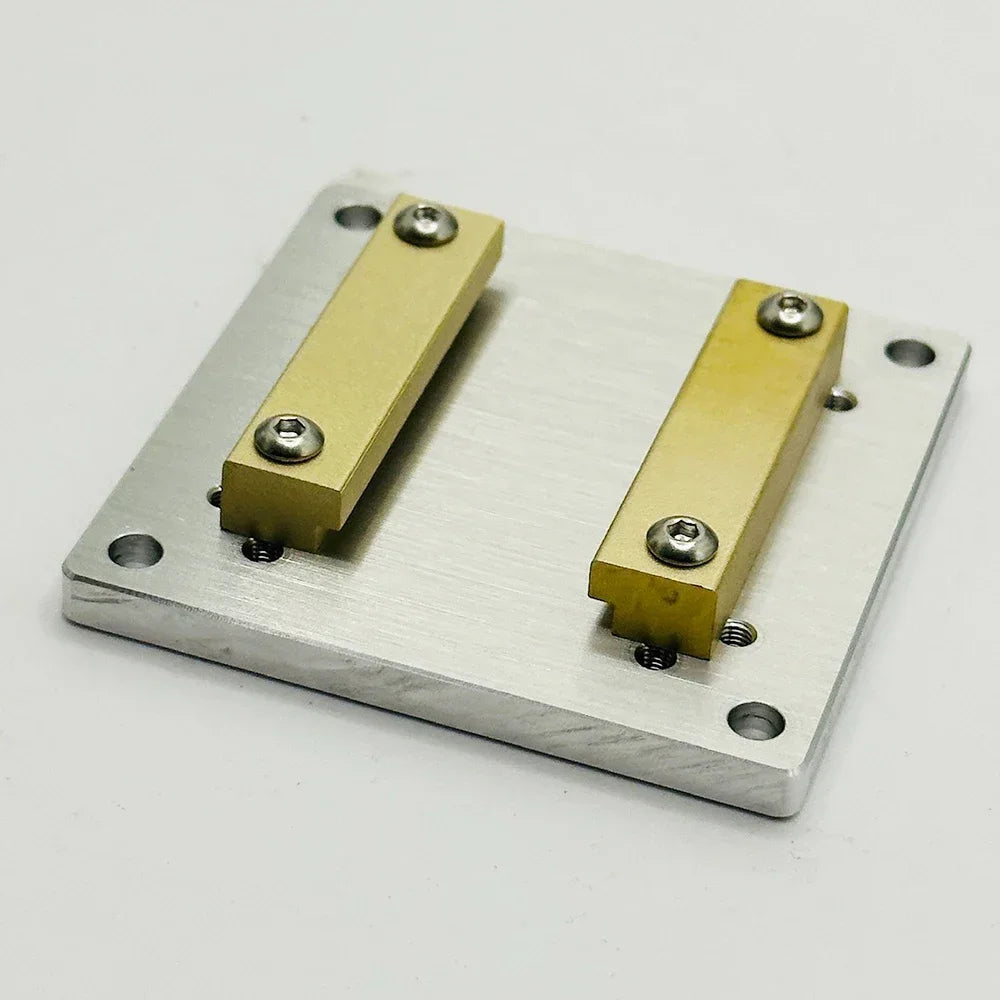 Three quarter view of the mounting plate and its brass rails
