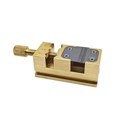 Side view of the brass vise showing the knurled screw