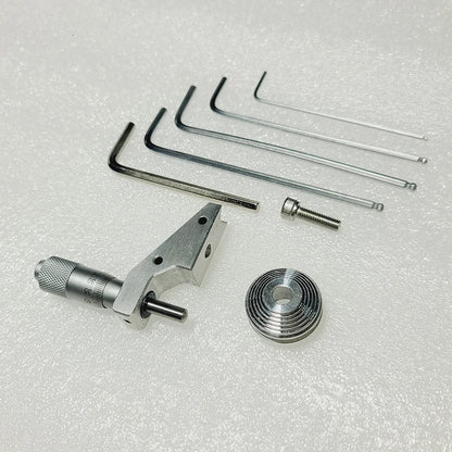 The hex keys, short and ball end, with the socket screw