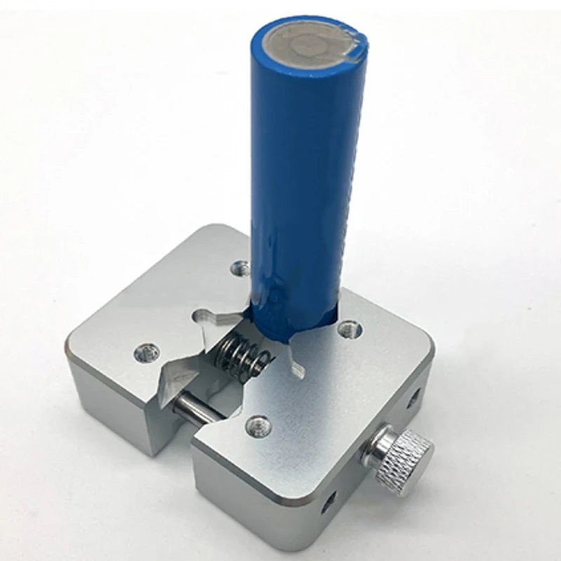 Drill press vise holding a small part