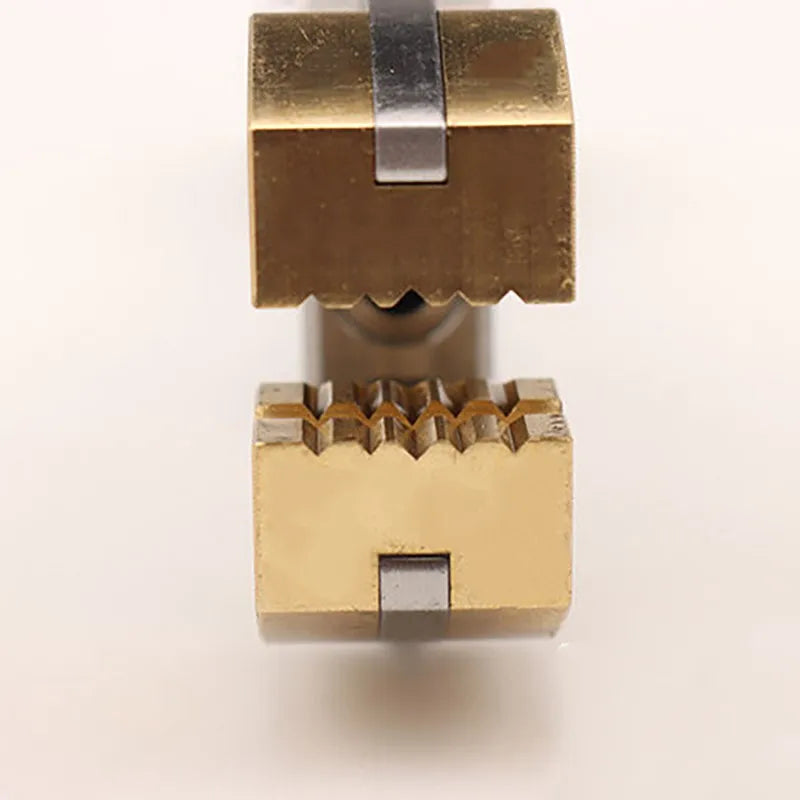 Brass jaws holding a small part