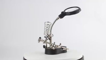 Helping hands with magnifier