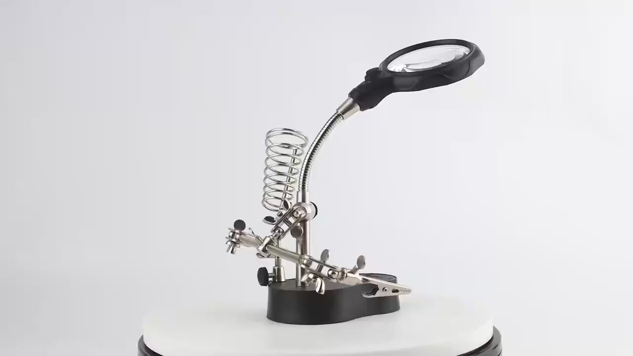 Helping hands with magnifier