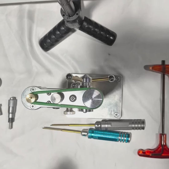 The micro-feed kit being fitted to a mini bench drill and the micrometer being turned