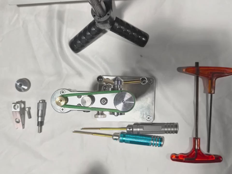 The micro-feed kit being fitted to a mini bench drill and the micrometer being turned